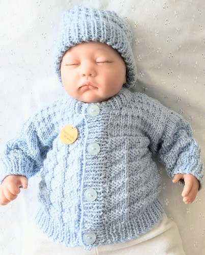 Hand knitted cardigan and - ,