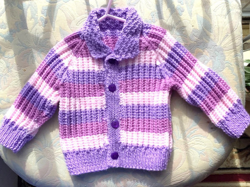 Hand knitted aran - hand,