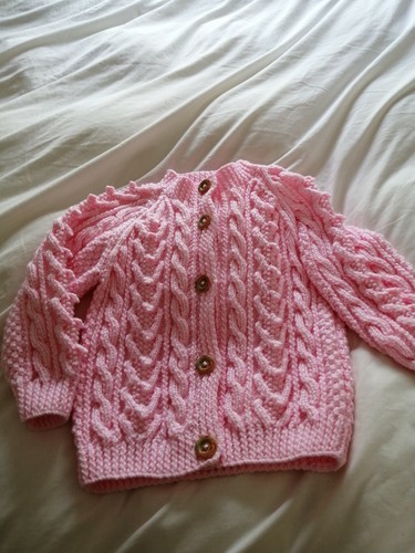 Hand knitted baby aran