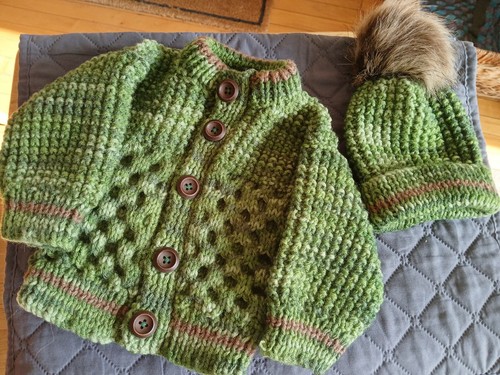 Hand knitted baby - hand,