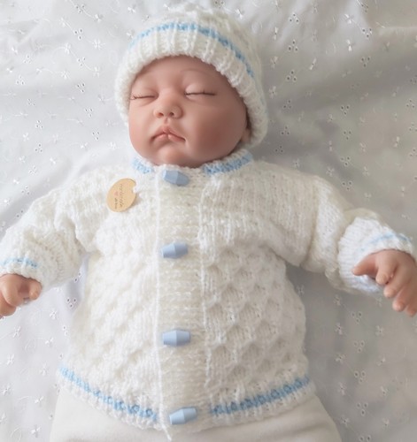 Hand knitted baby aran - hand,