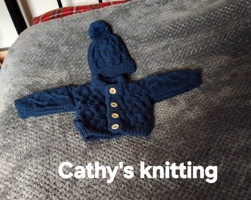 Hand knitted aran cardigan hat - hand,