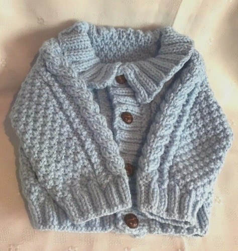 Hand knitted baby - hand,