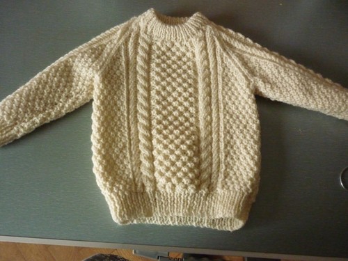 Hand knitted baby aran - hand,