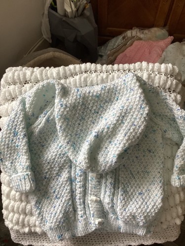 Hand knitted baby - hand, and