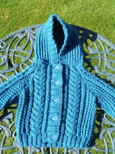 Hand knitted aran - hand,