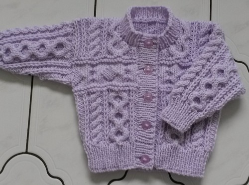 Hand knitted baby aran - hand,